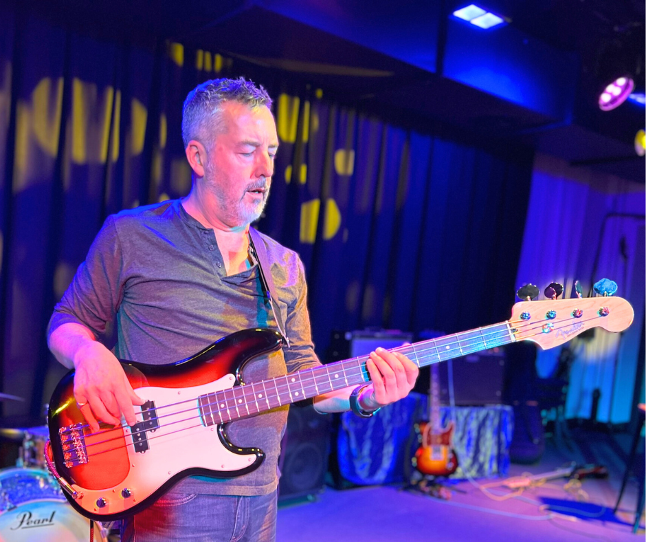 Steve playing the bass guitar